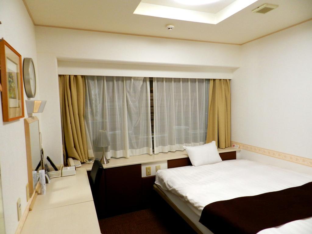 Check In Matsuyama Hotel Matsuyama  Bagian luar foto